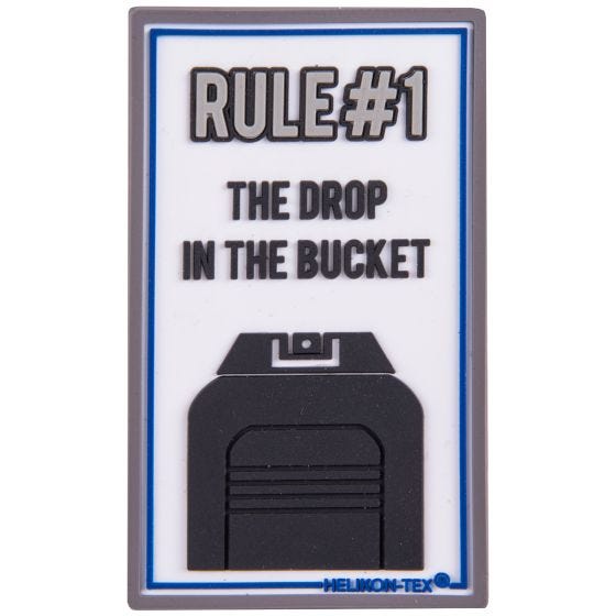 Helikon Patch mit Schriftzug „Rule#1“ Weiß